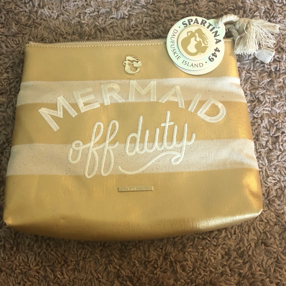 Gold and white striped Spartina 449 cosmetic bag